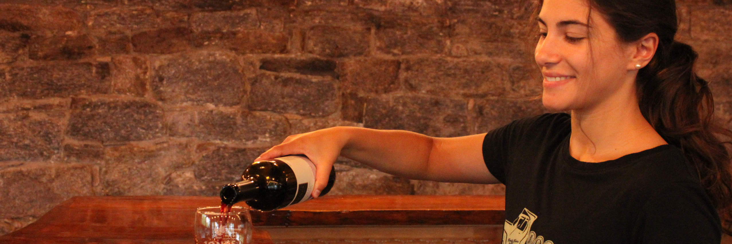 staff pouring wine