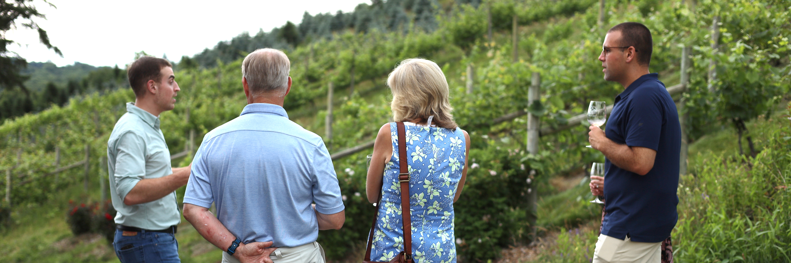 Winemaker talking to guests at the education vineyard