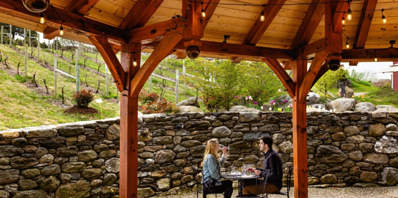 a couple Sitting under the pavilion