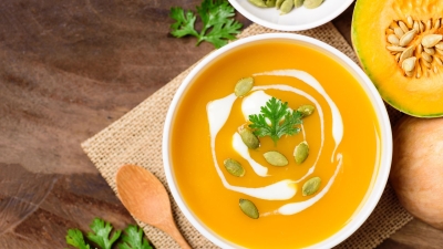 a steamy bowl of Butternut Squash and Coconut Curry Soup