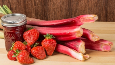 jar of chutney with fresh Strawberries and rhubarb