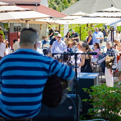 Artist on stage facing Jones Winery Summer Music Series crowd