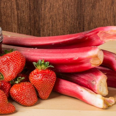 jar of chutney with fresh Strawberries and rhubarb