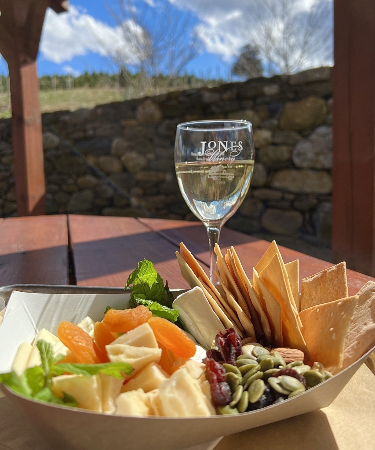 wine glass with charcuterie boat